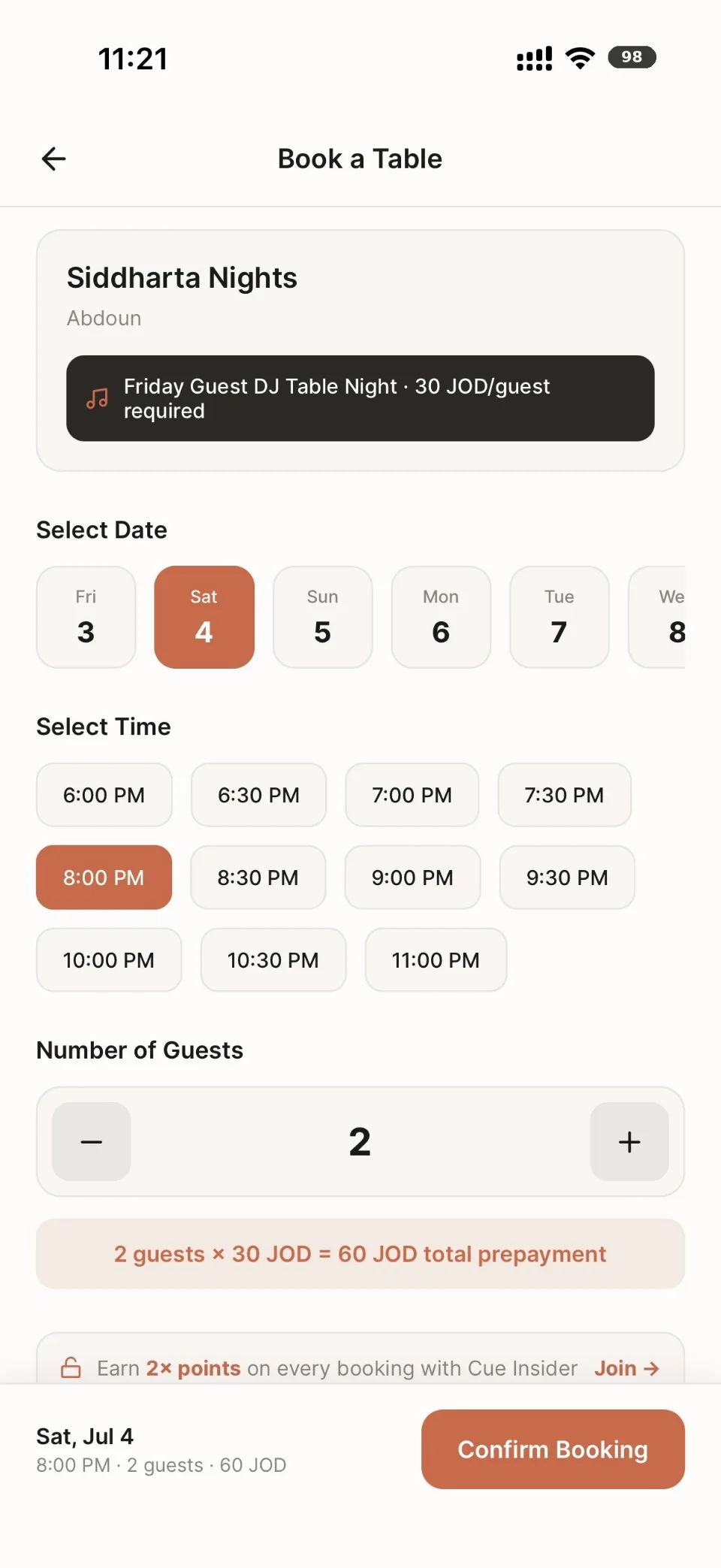 Cue guest app: the Book a Table screen, with venue, date, and time selection.